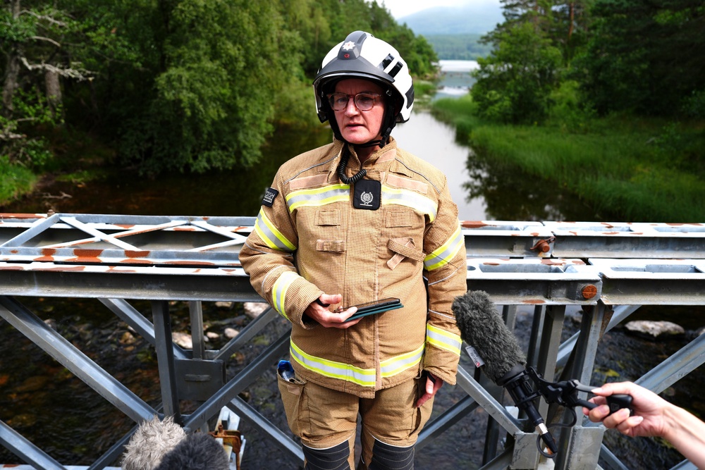 Scottish Fire and Rescue Area Commander Lynne Gow speaks to the media near Rothiemurchus Lodge in the Scottish Highlands (PA)