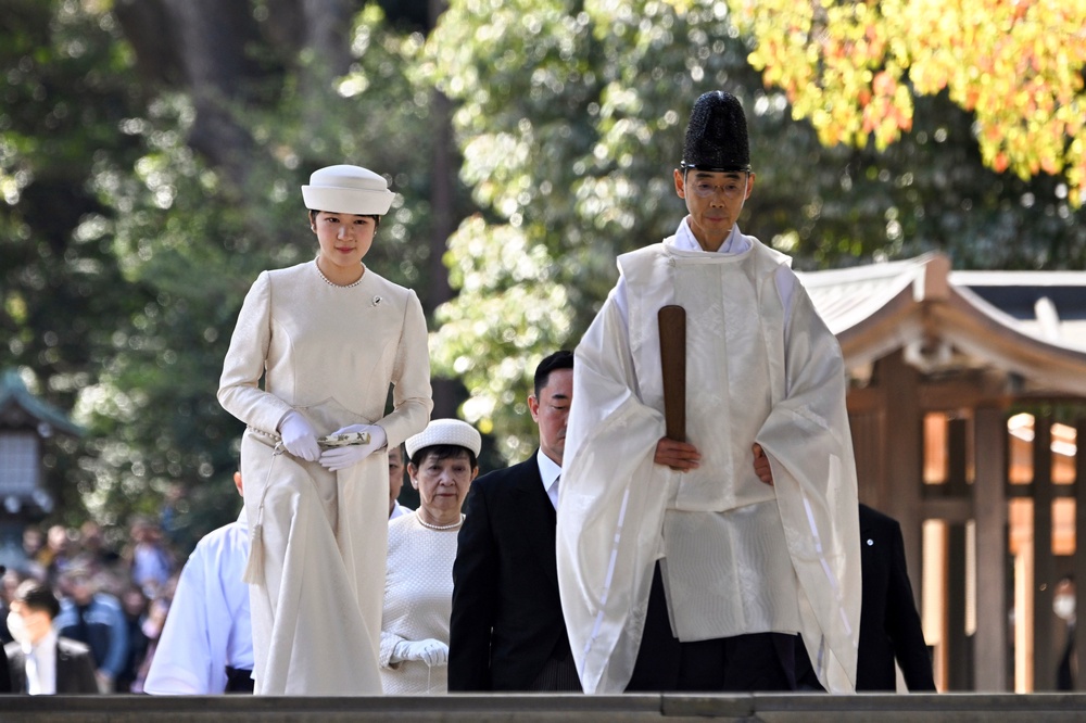 Japan's Princess Aiko, left, the daughter of Emperor Naruhito and Empress Masako (AP)