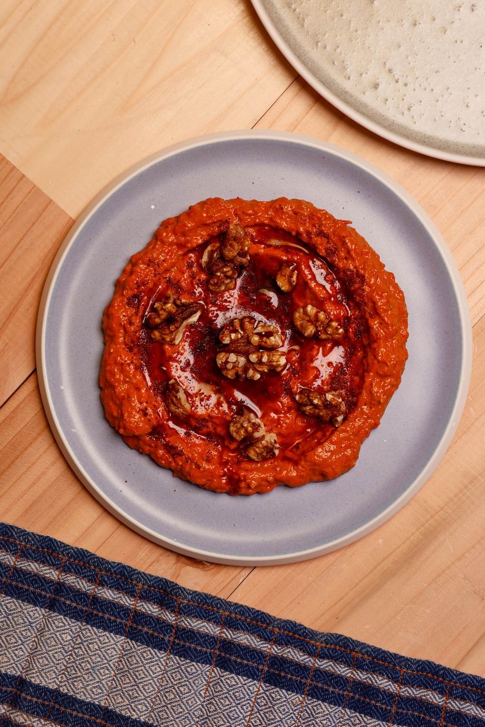 Charred peppers, walnuts and pomegranate molasses bring sweetness, smoke and sharpness (Rich Cullen/Kilm)