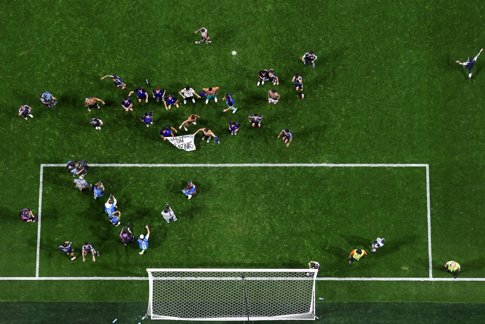The banner was waved by the players during wild post-match celebrations (Getty)