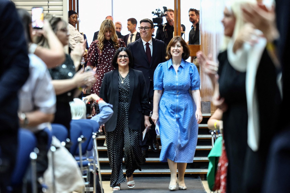 Shabana Mahmood, left, and Lucy Powell introduced the new leader (Reuters)