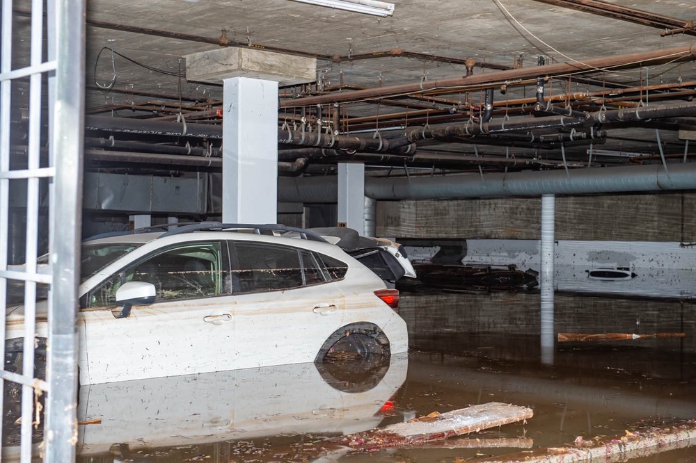 Photos showed what appeared to be an underground parking lot submerged under several feet of water on Thursday. (Los Angeles Fire Department)