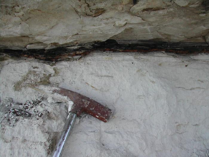 Residue of the crater’s impact was found in a thin layer of clay (Credit: Dr. Philippe Claeys)