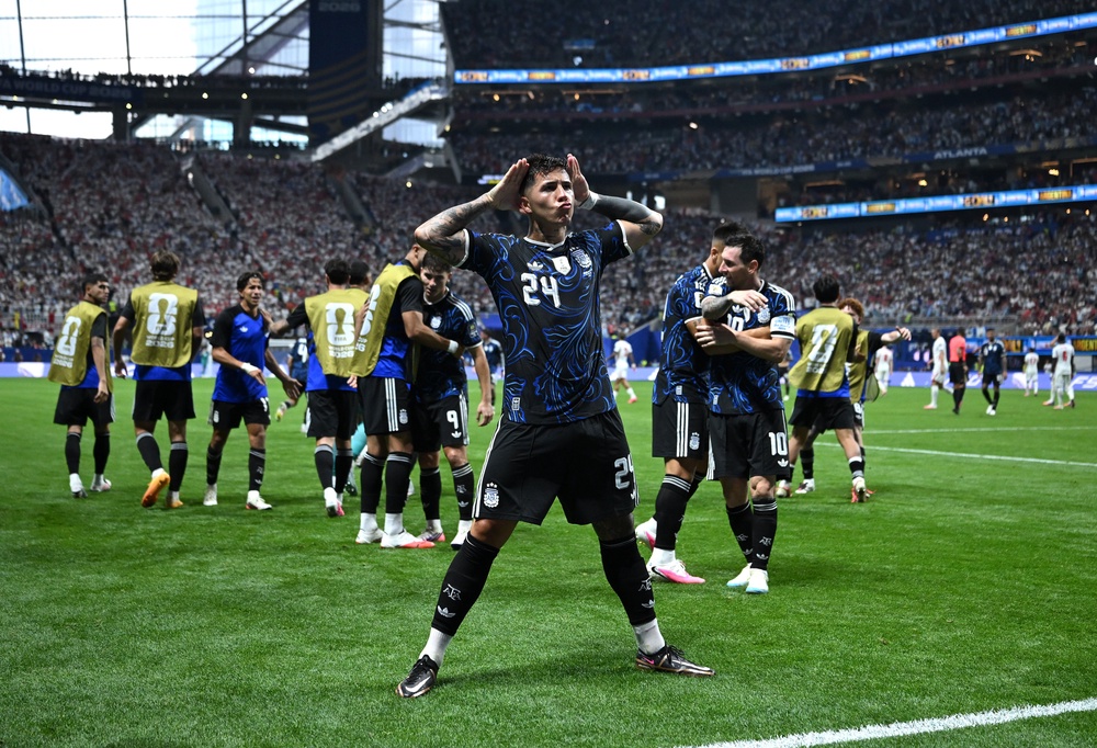 Enzo Fernandez of Argentina celebrates scoring against England (Getty)