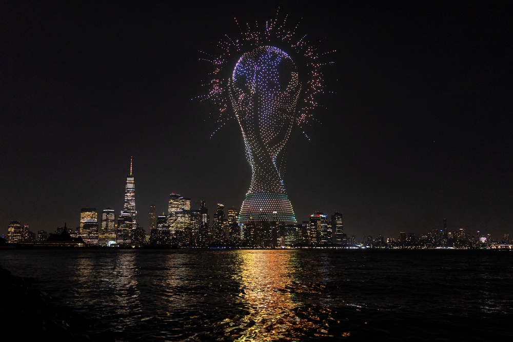 A general view as a drone show takes place over the New York Harbour, displaying a graphic of the FIFA World Cup trophy (Getty)