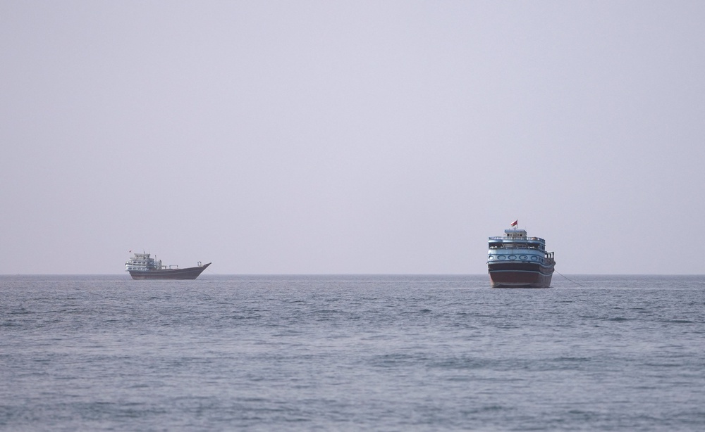 Vessels at the Strait of Hormuz, as seen from Musandam, Oman (Reuters)