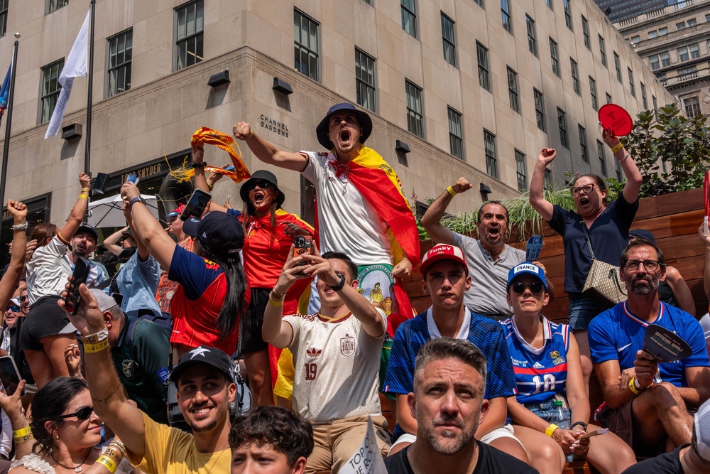 Spain fan reacts after the team scored their first goal during the World Cup semifinal soccer match between Spain and France at a watch party at the Rockefeller Center fan village, Tuesday, July 14, 2026, in New York. (AP Photo/Adam Gray) (AP Photo/Adam Gray)