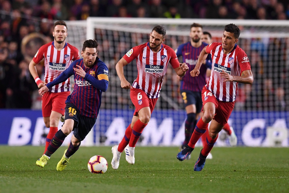 Lionel Messi up against Rodri during their time at Barcelona and Atletico Madrid respectively (Getty)