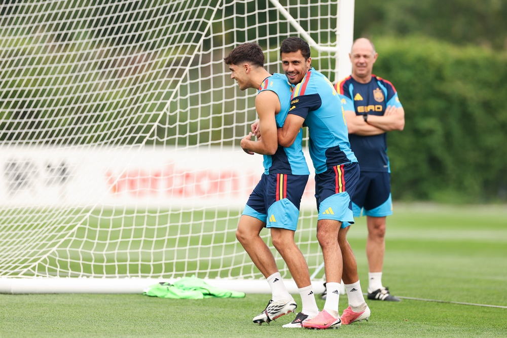 Rodri and Pau Cubarsi of Spain interact during the training session (Getty)