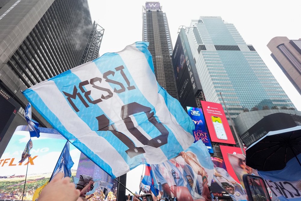 Argentina fans gather for a rally on the eve of the World Cup final soccer match in New York's Times Square (AP)