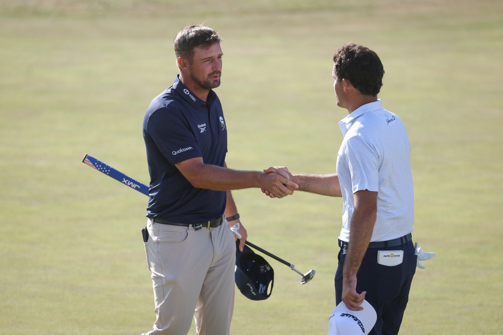 Bryson DeChambeau shakes hands with Jackson Suber (Getty)