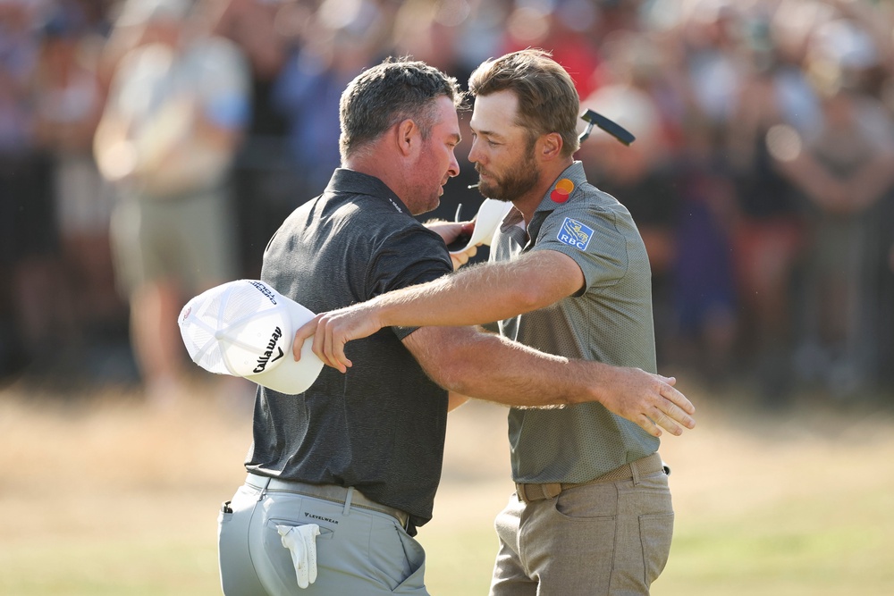 Ryan Fox of New Zealand is congratulated by third-round leader Sam Burns (Getty)