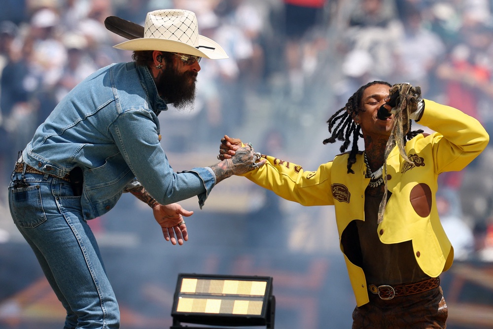Post Malone and Swae Lee sang their song 'Sunflower' during the closing ceremony before the match (Reuters)