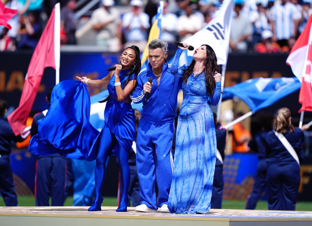 Nicole Scherzinger, Robbie Williams and Laura Pausini perform at the closing ceremony (Bradley Collyer/PA Wire)