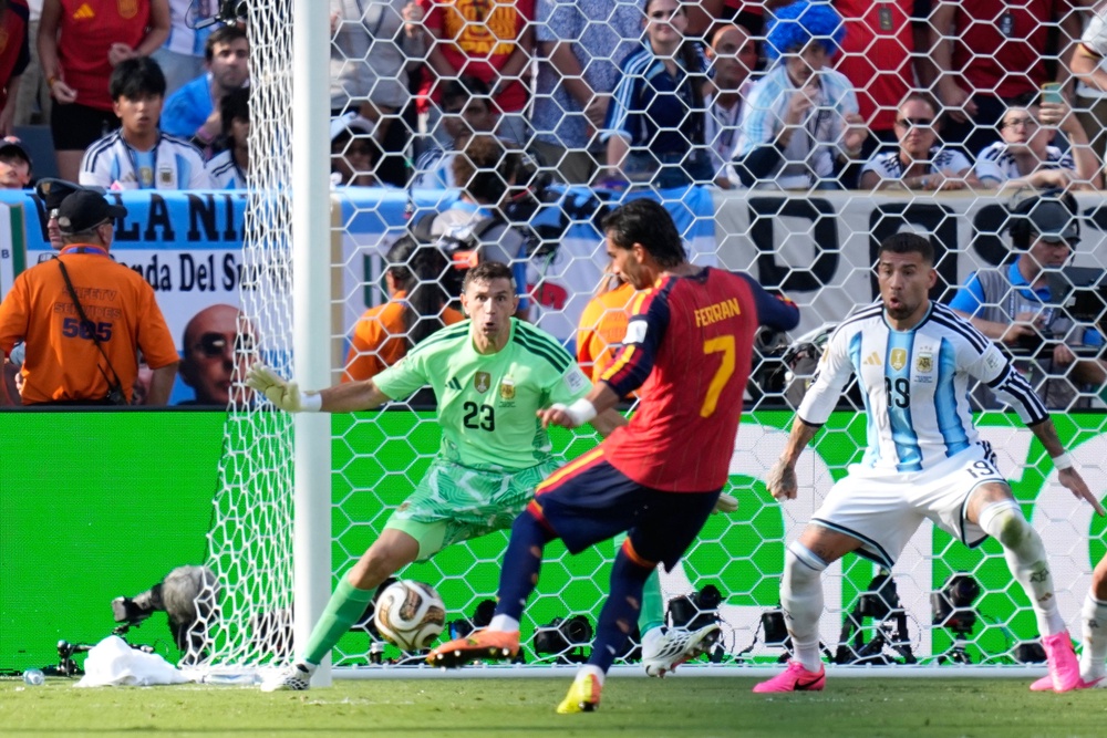 Torres smashed in the opening goal in the 106th minute as Spain dominated a tired Argentina (AP)
