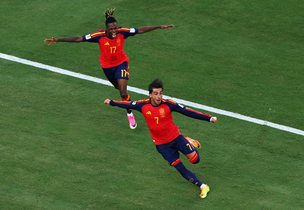 Spain’s Ferran Torres celebrates scoring their first goal with Nico Williams (Reuters)