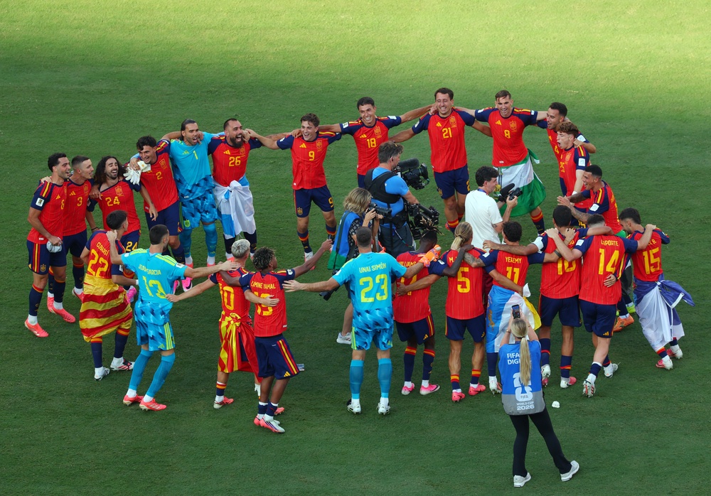 Spain players celebrate after winning the World Cup (Reuters)