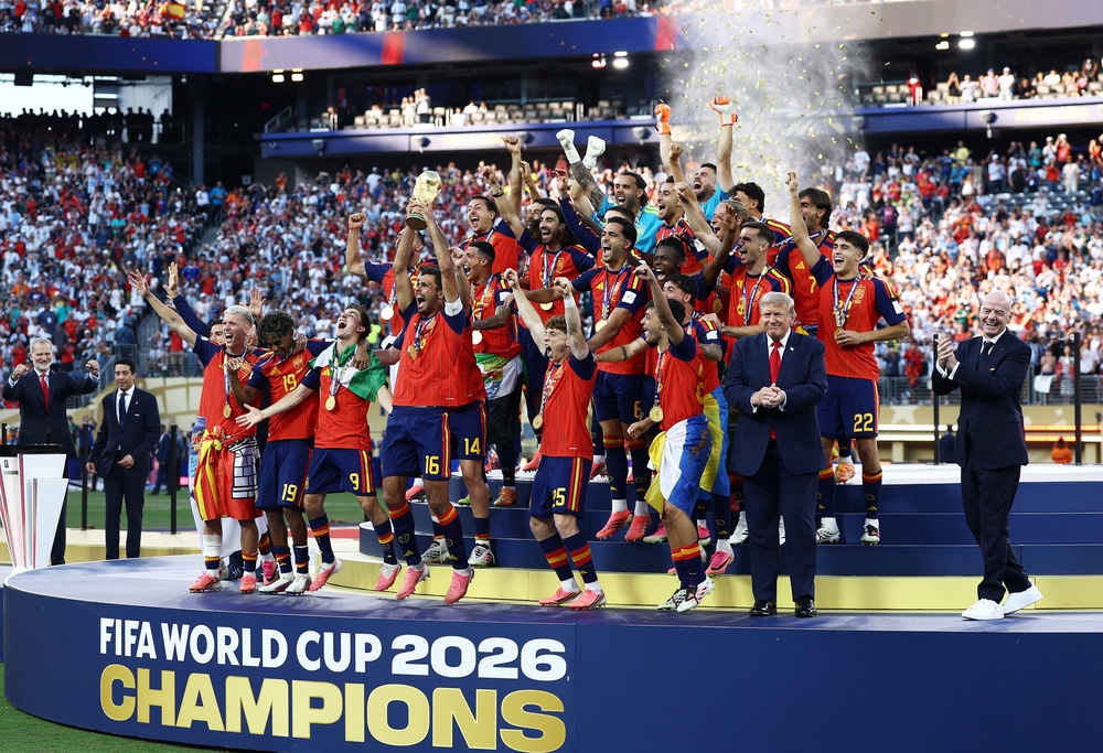 And he ensured he was in the photo for the trophy lift before moving off the stage (Reuters)