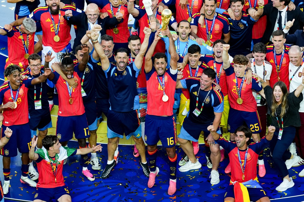 Spain’s Rodri lifts the FIFA World Cup Trophy (PA)