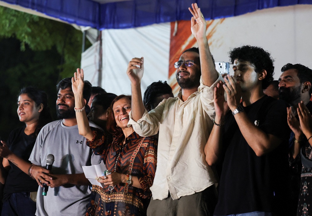 Abhijeet Dipke, head of the Cockroach Janta Party, and Gitanjali J Angmo, wife of education reformer and activist Sonam Wangchuk, during the protest at Jantar Mantar (Reuters)
