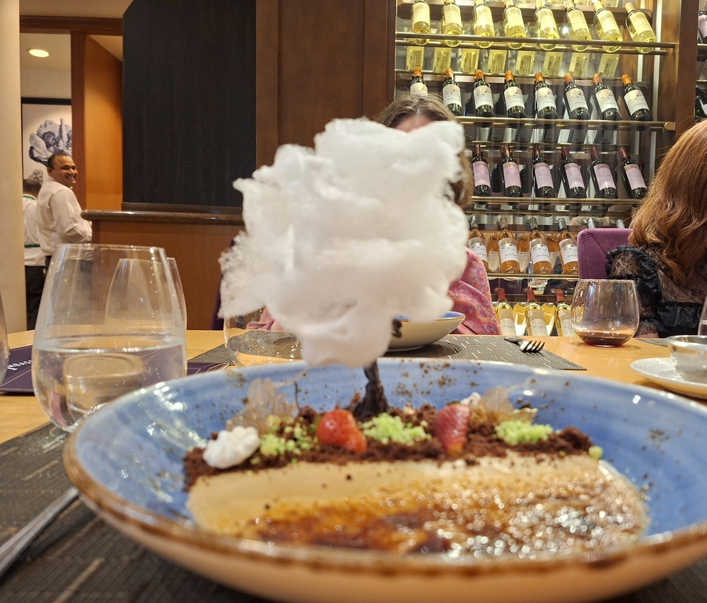 The candyfloss tree had a chocolate trunk and decorated a bowl of creme brulee (Amy Crowther/PA)
