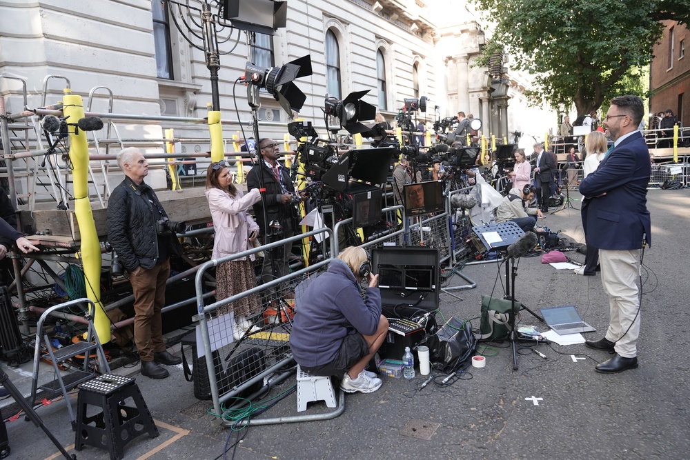 The press gathers outside No 10 ahead of Andy Burnham being confirmed as the new prime minister (PA)