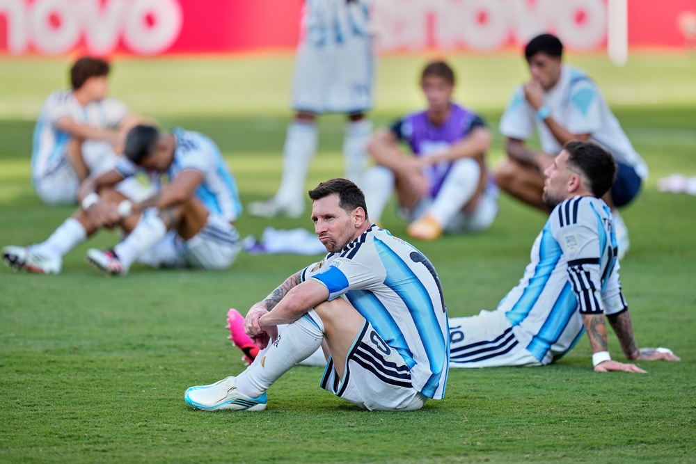 Argentina's Lionel Messi reacts after the team's defeat to Spain in the World Cup final (AP)