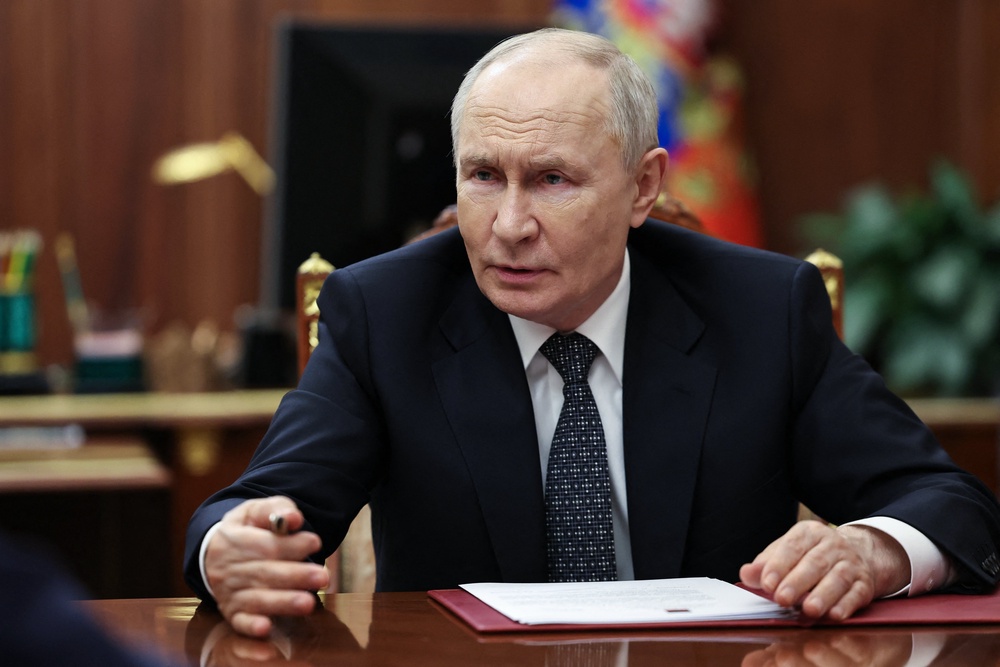 In this pool photograph distributed by the Russian state agency Sputnik, Russia's President Vladimir Putin meets with Moscow-installed leader of the Russian-controlled parts of the Zaporizhzhia region, at the Kremlin in Moscow on July 20, 2026 (AFP/Getty)