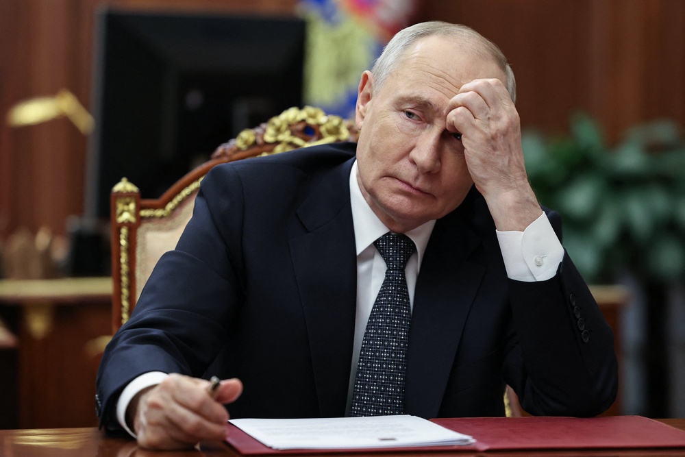 In this pool photograph distributed by the Russian state agency Sputnik, Russia's President Vladimir Putin meets with Moscow-installed leader of the Russian-controlled parts of the Zaporizhzhia region, at the Kremlin in Moscow on July 20, 2026 (AFP/Getty)