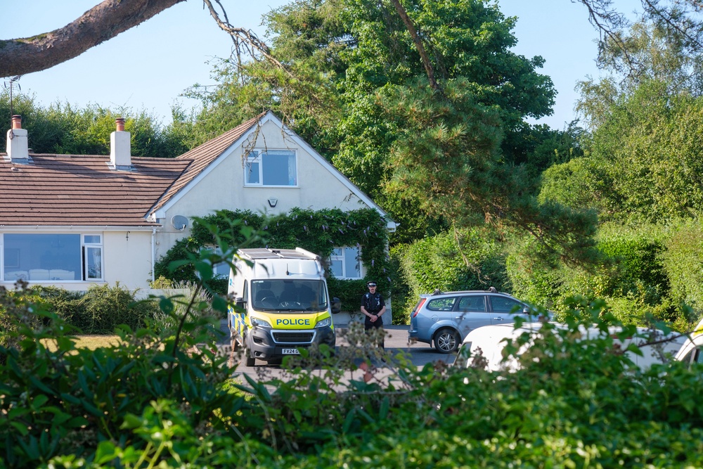 Police outside the house of Ann Widdecombe in Haytor, Dartmoor (PA Wire)