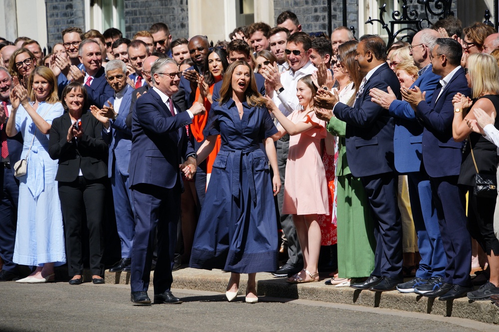 Sir Keir walked down the street with his wife Victoria after delivering his speech (Ben Birchall/PA) (PA Wire)