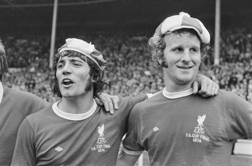 Liverpool footballers Kevin Keegan (left) and Alec Lindsay after their 3-0 win in the 1974 FA Cup Fina (Getty)