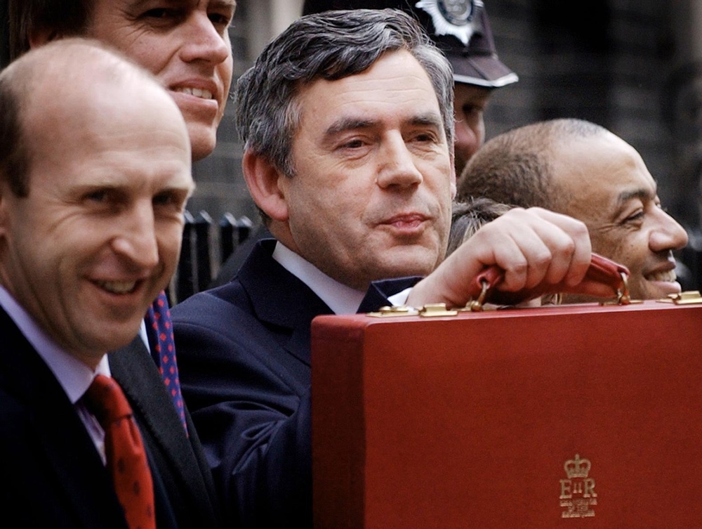 John Healey, left, with then-chancellor Gordon Brown (Stefan Rousseau/PA)