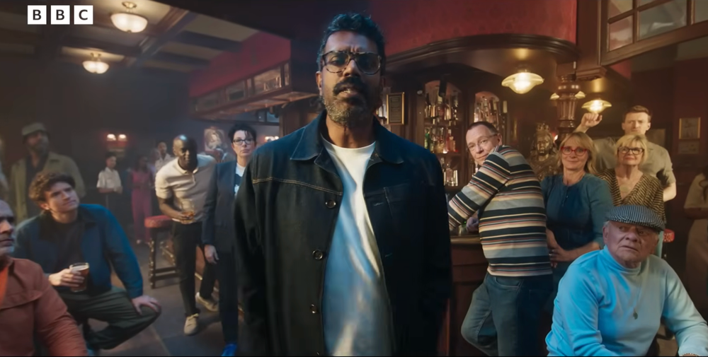 Romesh Ranganathan with Trevor Nelson, Sue Perkins, Adam Woodyatt, David Jason and other stars in BBC advert (BBC)