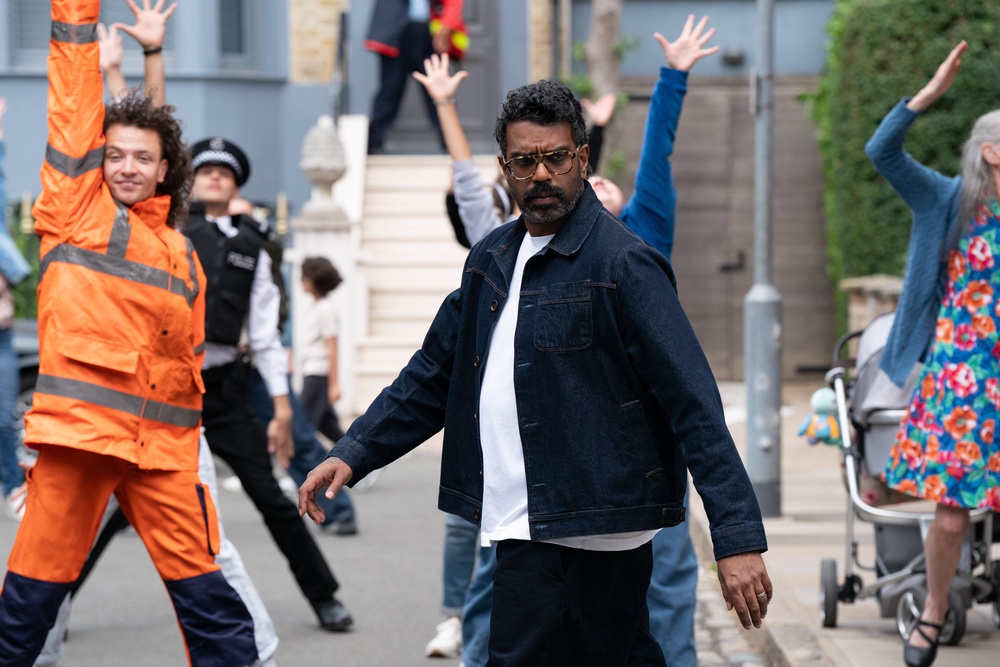 Ranganathan strolls through Albert Square in the video (BBC/PA) (PA Media)