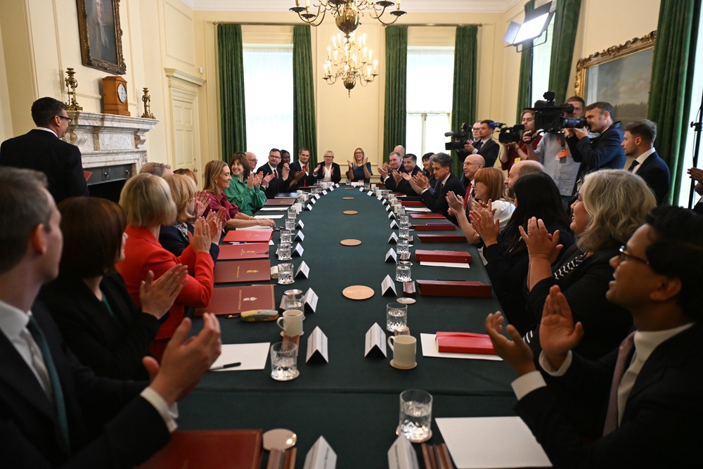Prime Minister Andy Burnham arrives to applause at his first Cabinet meeting (Eddie Mulholland/Daily Telegraph/PA) (PA Wire)