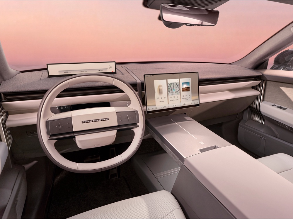 The Range Rover GT features a large central touchscreen and slim driver display. The gear selector has been moved to a stalk behind the steering wheel (Range Rover)