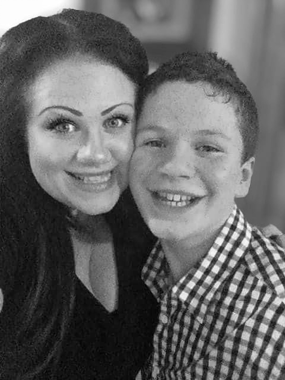 Fiona Garrett with her son Joshua Robbins who died after his balcony railings gave way and he fell from his flat (PA)
