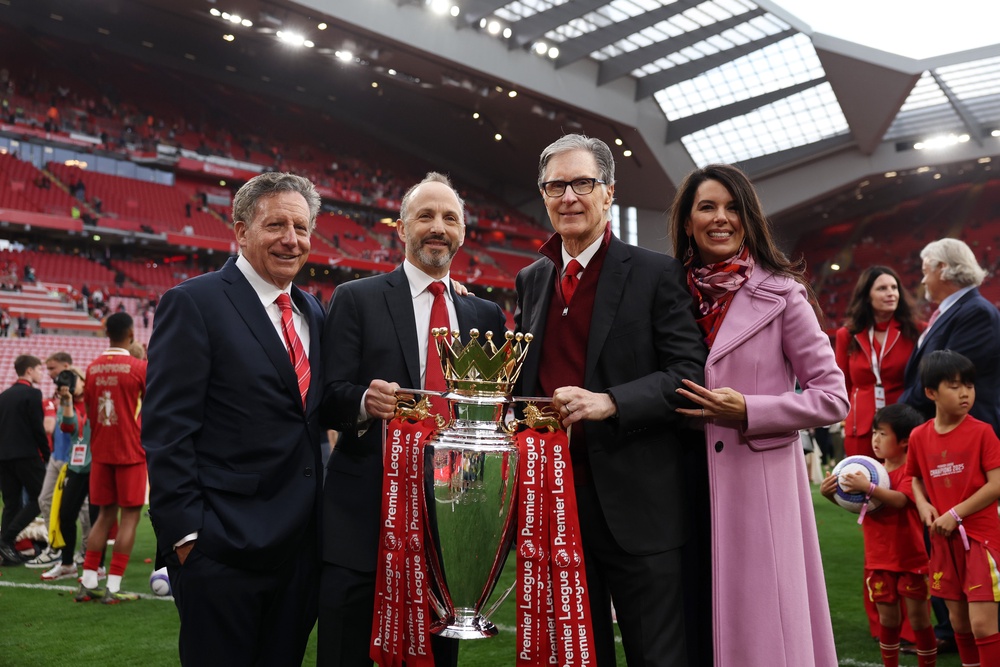 Tom Werner, Chairman of Liverpool, Michael Gordon, President of Fenway Sports Group and John Henry, Principle Owner of Liverpool and his wife Linda Pizzuti (Getty)