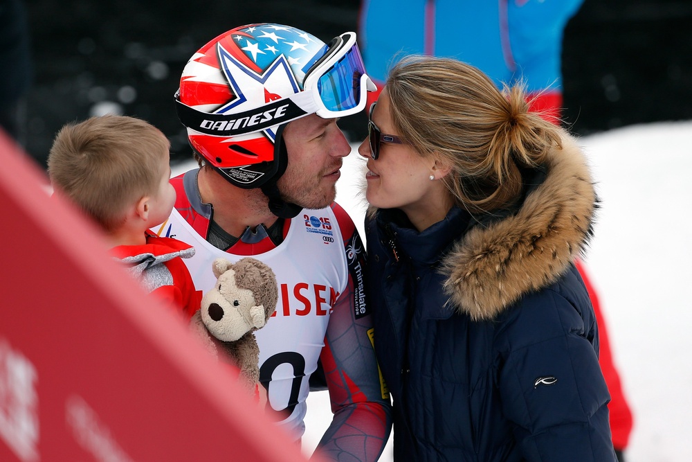 Olympic skier Bode Miller kisses his wife Morgan at the 2015 FIS Alpine World Ski Championships in Colorado. They lost their 19-month-old daughter Emmy after she was found in their neighbors’ pool in 2018 (Getty)
