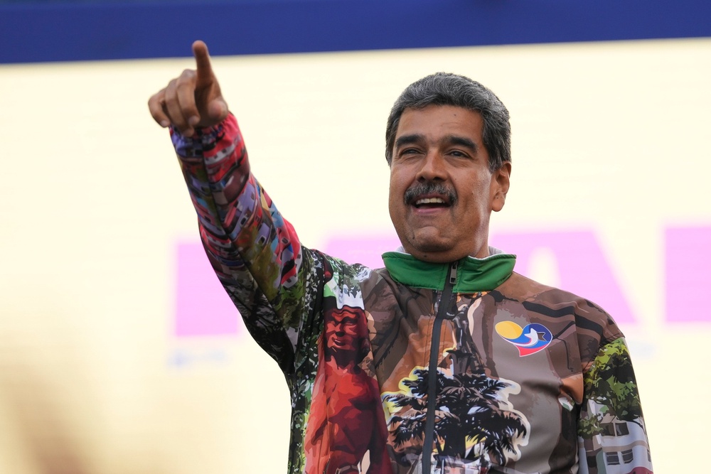 Maduro points to supporters during a campaign rally in the Catia neighborhood of Caracas, Venezuela, July 18, 2024 (Copyright 2024 The Associated Press. All rights reserved)