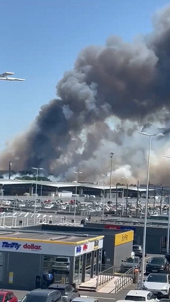 A huge plume of smoke rises near the Bordeaux Airport (Reuters)