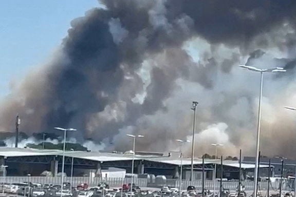 Smoke rises near the Bordeaux-Merignac Airport in France, July 21 (X/@hichem33600)