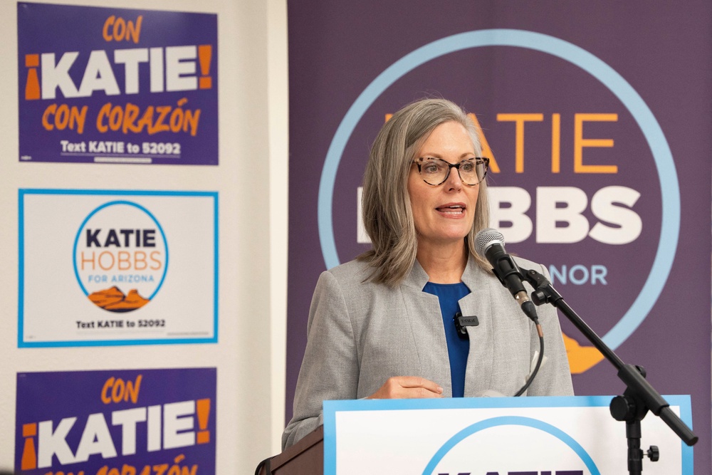 Arizona Governor Katie Hobbs speaks to volunteers participating in a phone bank during Arizona’s primary election in Phoenix (Reuters)