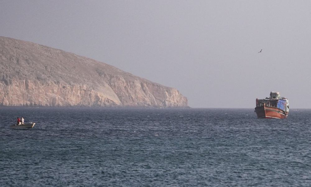 A vessel in the Strait of Hormuz, as seen from Musandam,Oman, July 16, 2026 (Reuters)