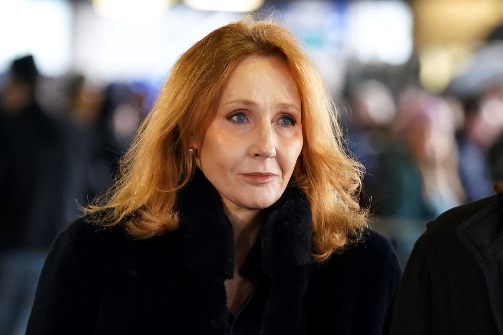 JK Rowling has been an outspoken critic of Ms Sturgeon (PA Archive)