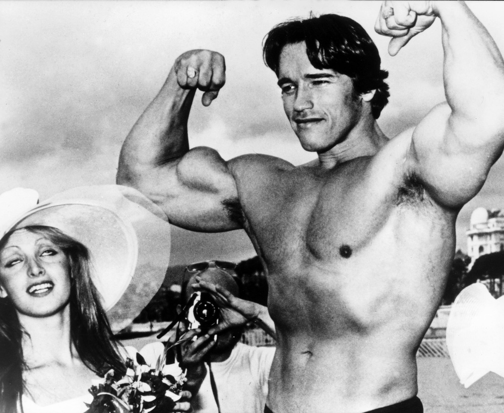 Arnold Schwarzenegger during the 38th Cannes film festival where he presented Pumping Iron, a documentary that spread his fame beyond bodybuilding circles (AFP via Getty Images)
