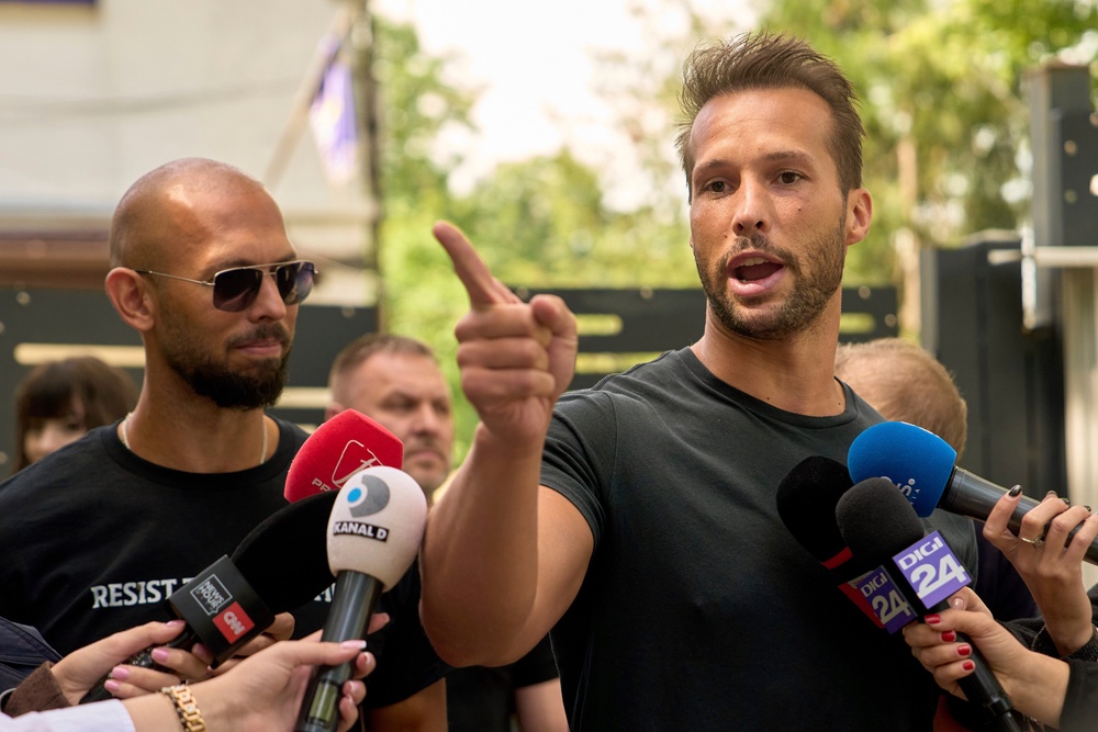 Andrew Tate, left, and his brother Tristan are expected to appeal any extradition request (Vadim Ghirda/AP) (AP)