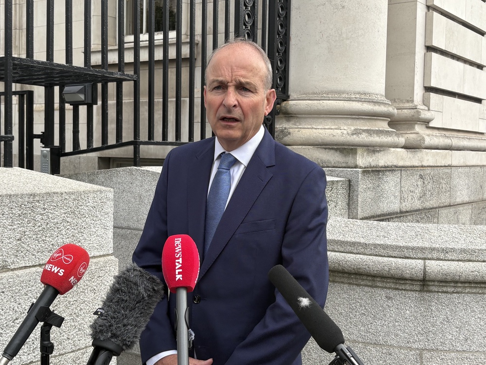 Taoiseach Micheál Martin speaks to the media outside Government Buildings in Dublin (David Young/PA) (PA Wire)