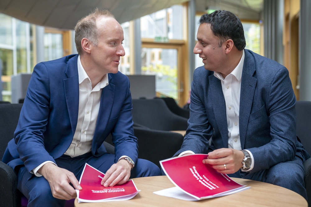 Michael Marra (left) seen here with Anas Sarwar, is described as being a frontrunner in the contest to be Scottish Labour’s next leader. (Jane Barlow/PA)